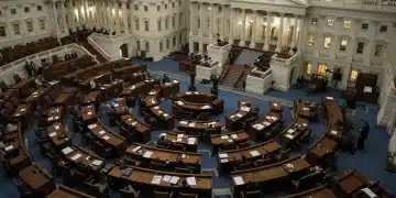 US Capitol building with lights on, symbolizing active congressional debate on healthcare reform.